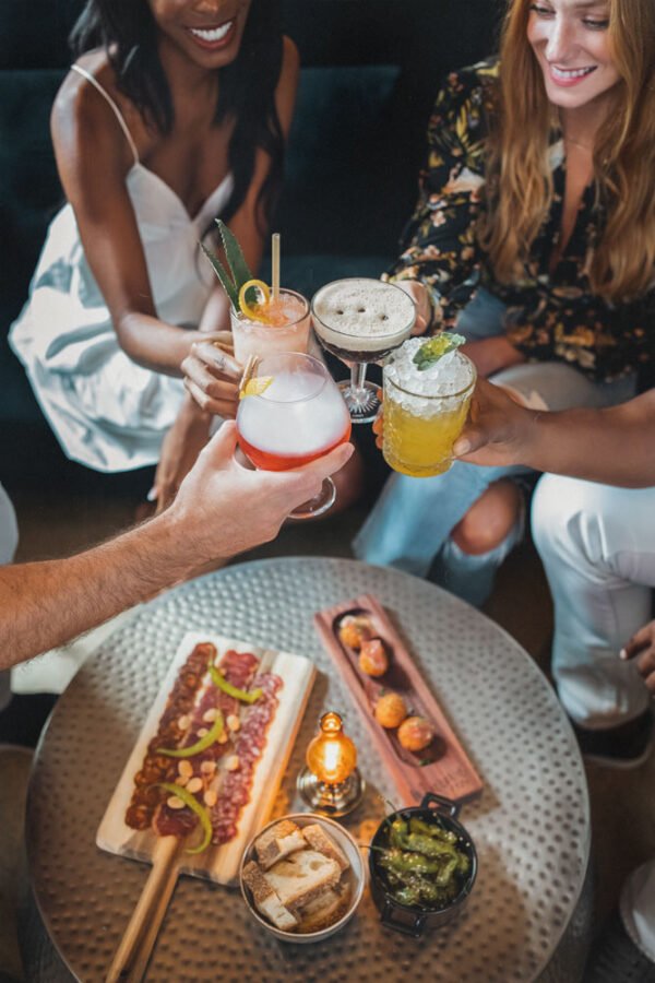 Group of friends at Bar1939 at National Hotel Miami Beach